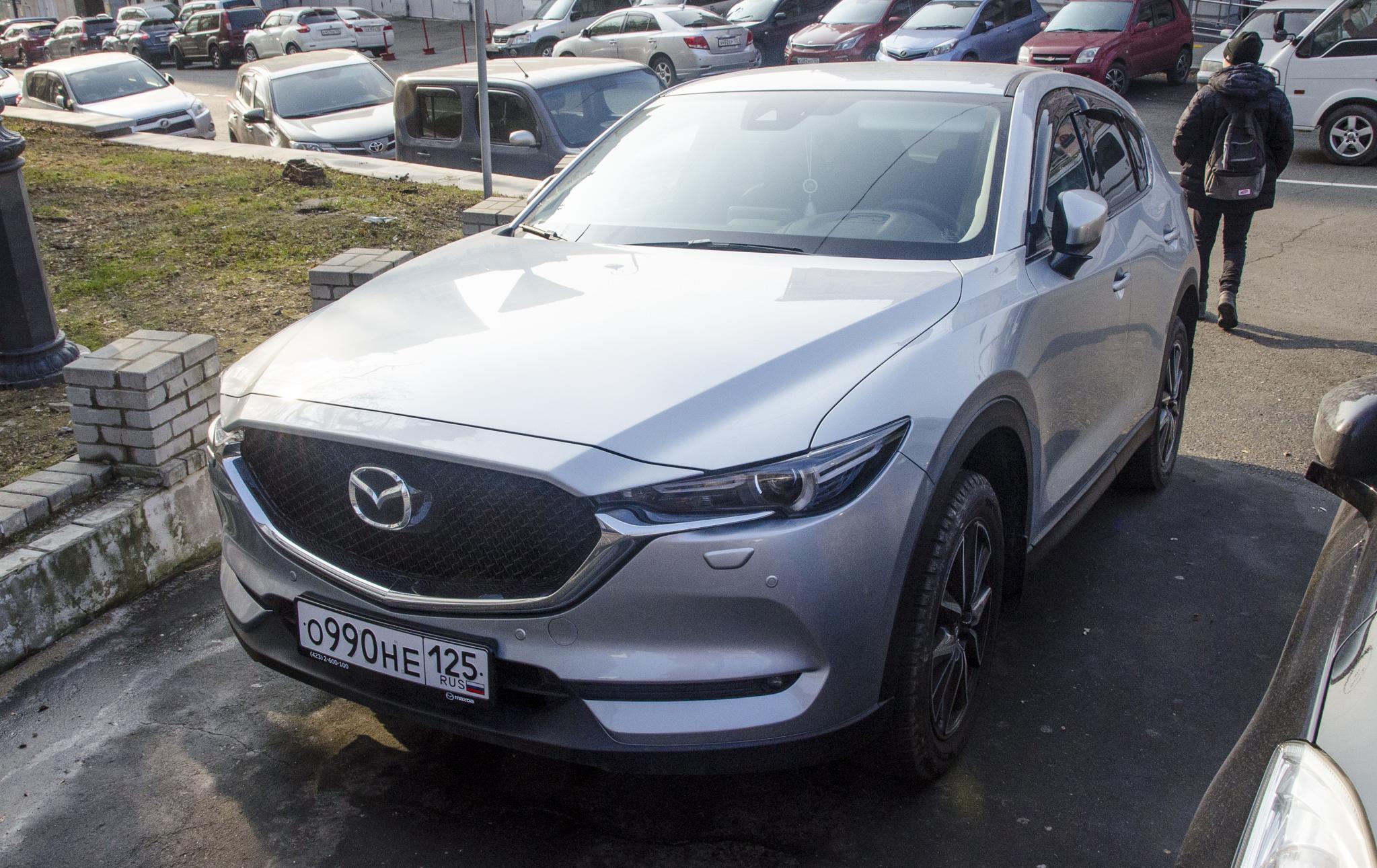 Автомобиль госномер О990НЕ125