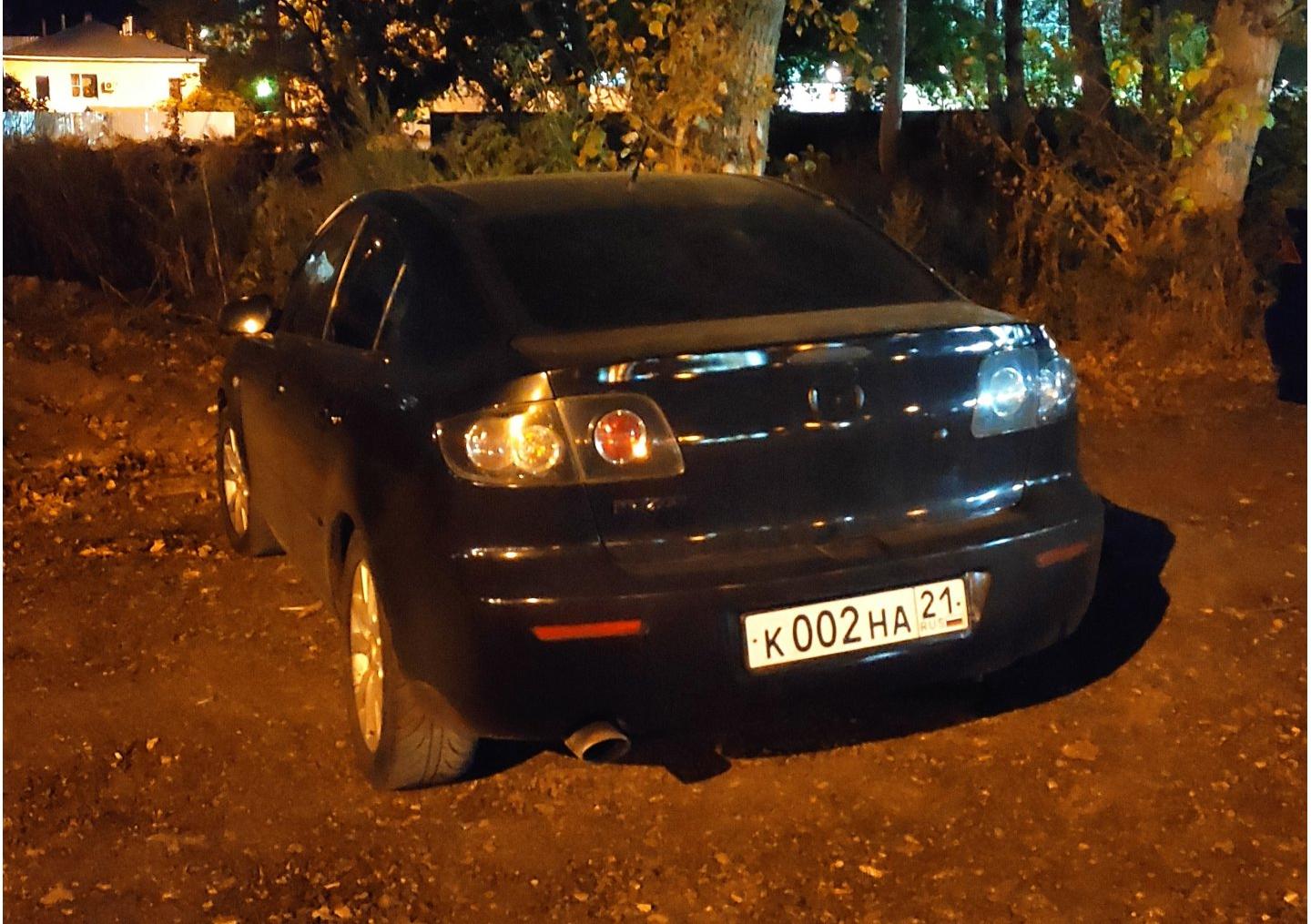 Автомобиль госномер К002НА21