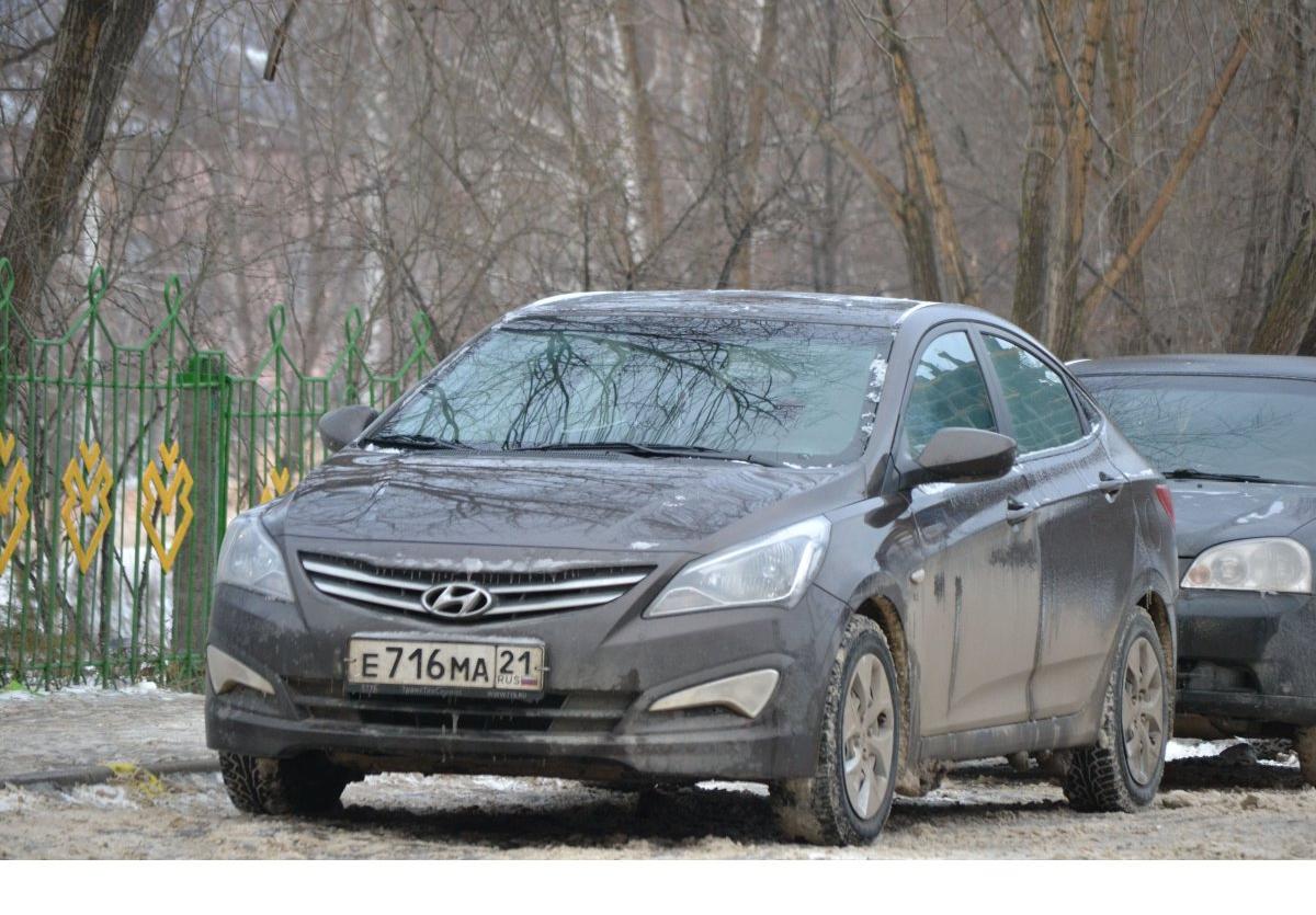 Автомобиль госномер Е716МА21