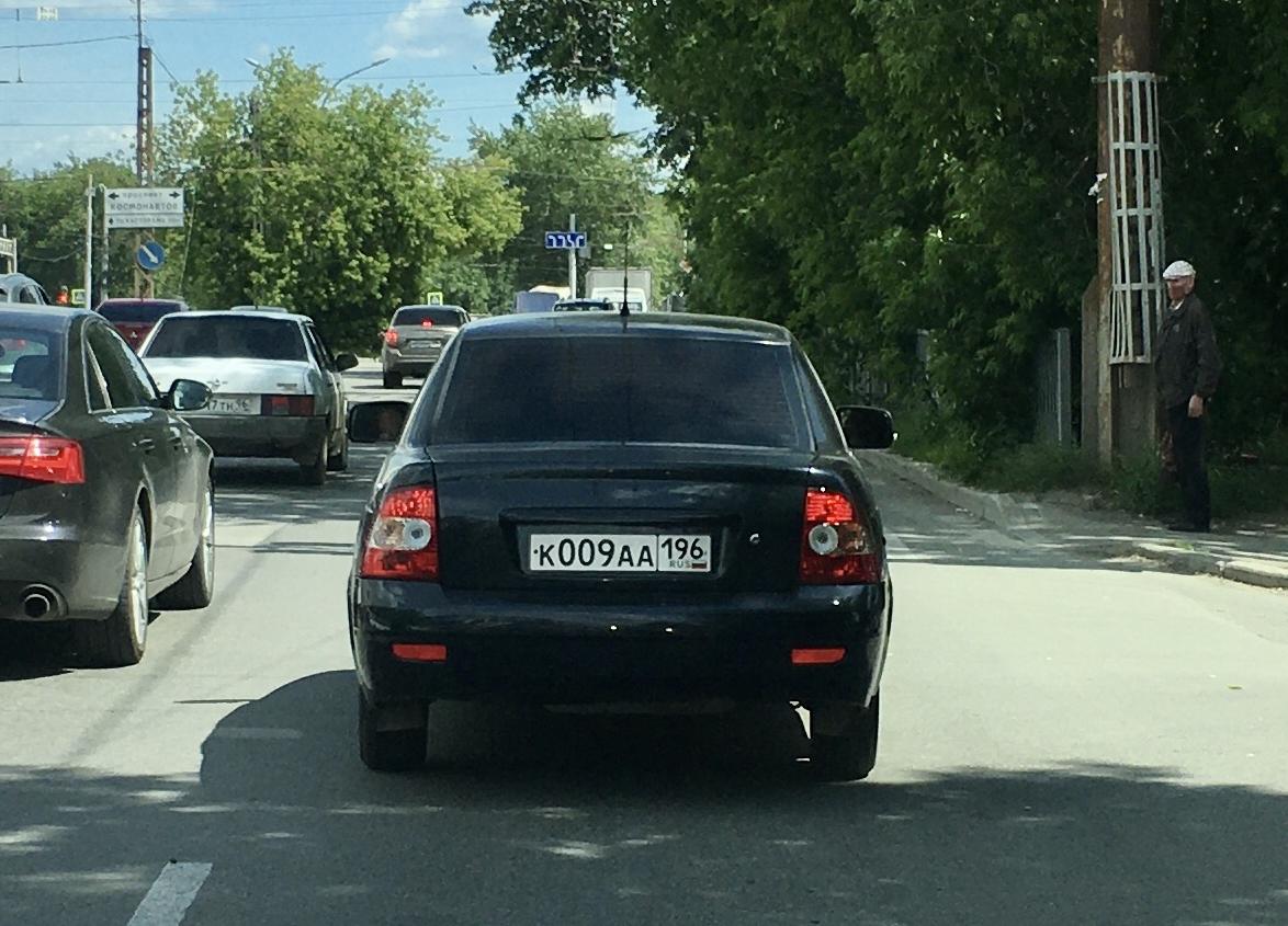 Автомобиль госномер К009АА196