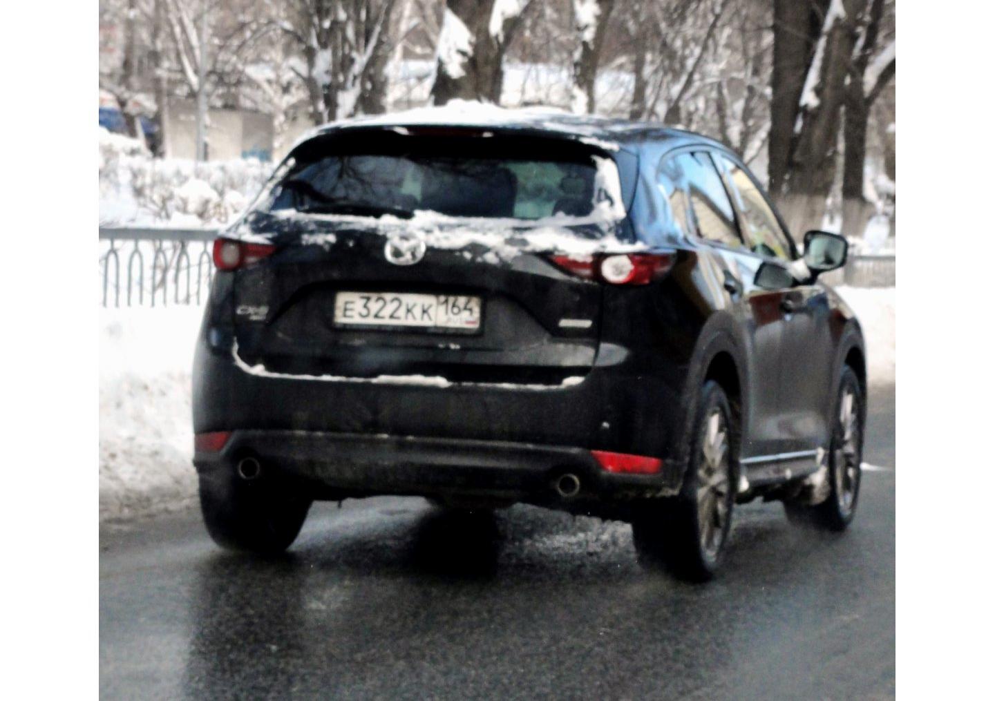 Автомобиль госномер Е322КК164