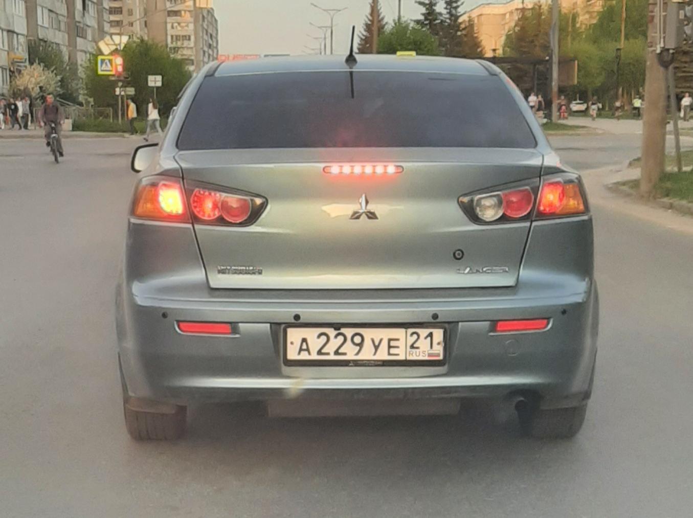 Автомобиль госномер А229УЕ21