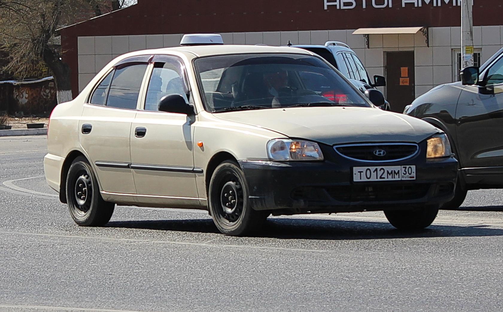 Автомобиль госномер Т012ММ30
