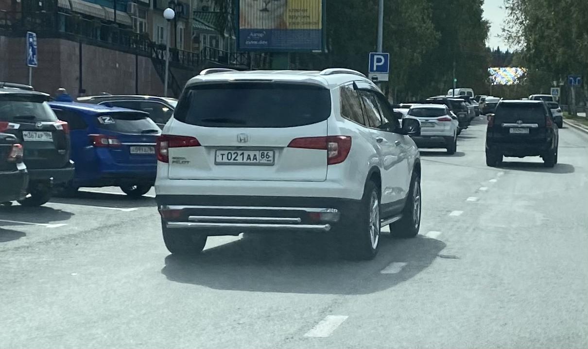 Автомобиль госномер Т021АА86