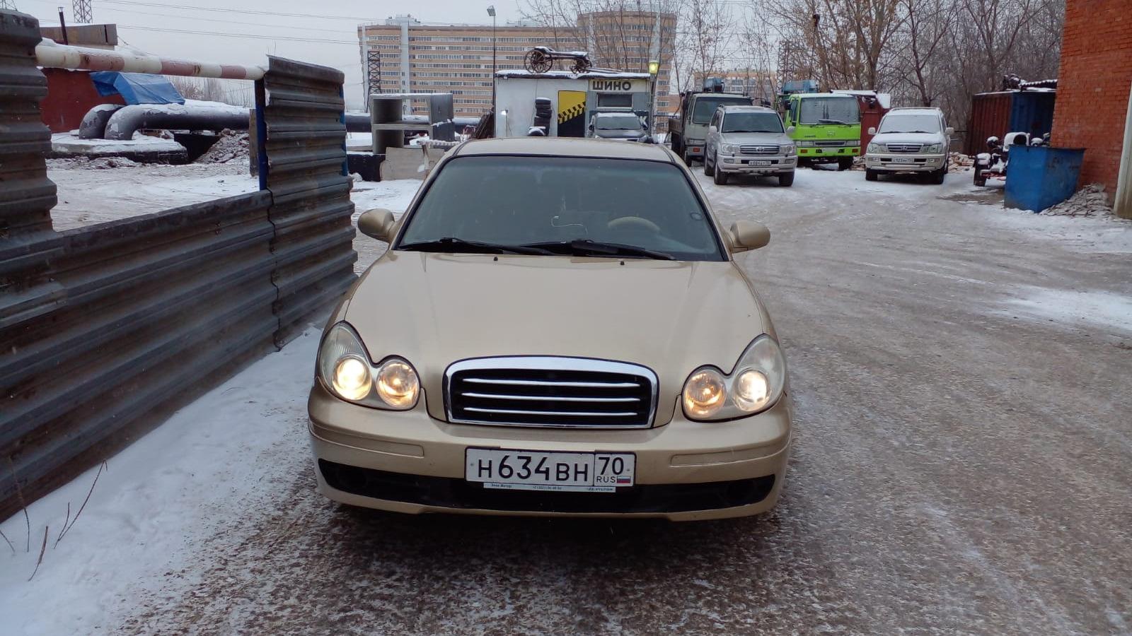 Автомобиль госномер Н634ВН70