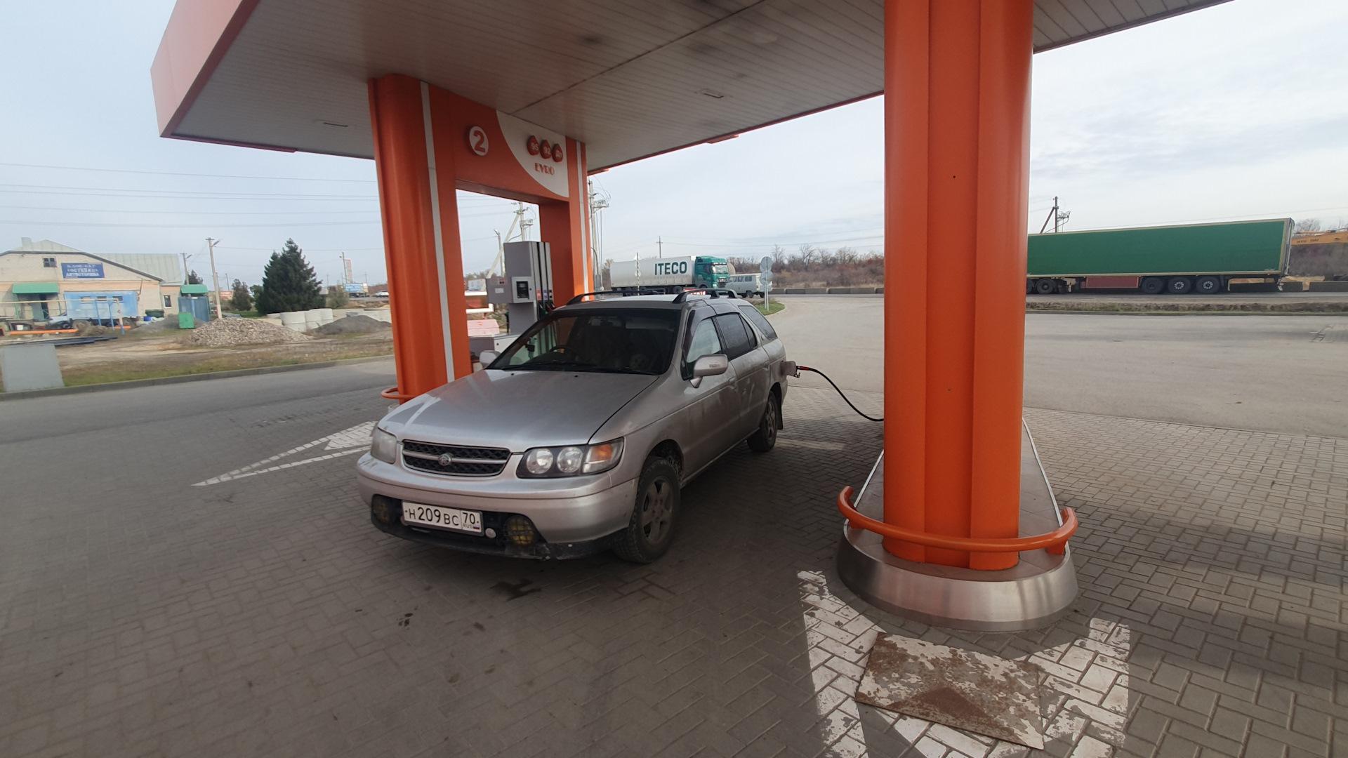 Автомобиль госномер Н209ВС70