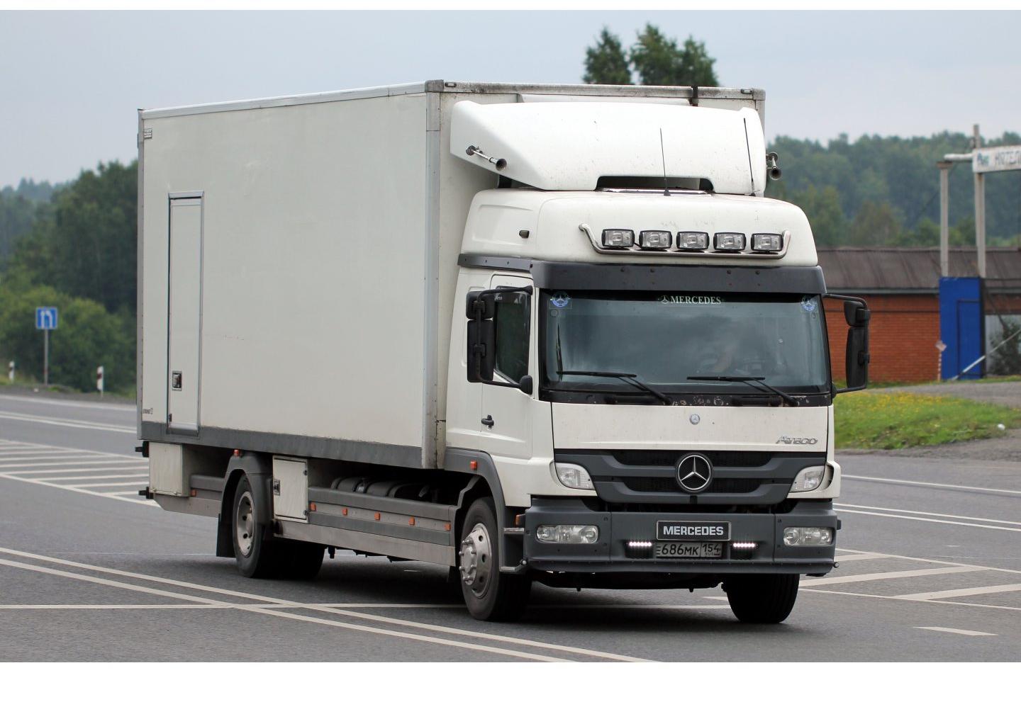 Автомобиль госномер Е686МК154