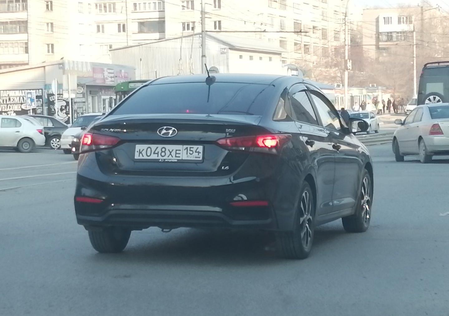 Автомобиль госномер К048ХЕ154