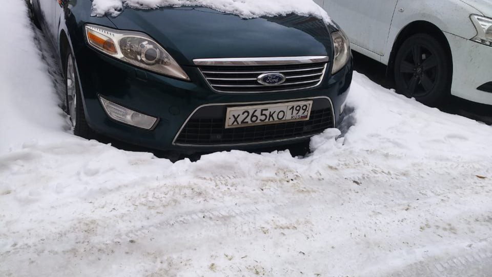 Автомобиль госномер Х265КО199