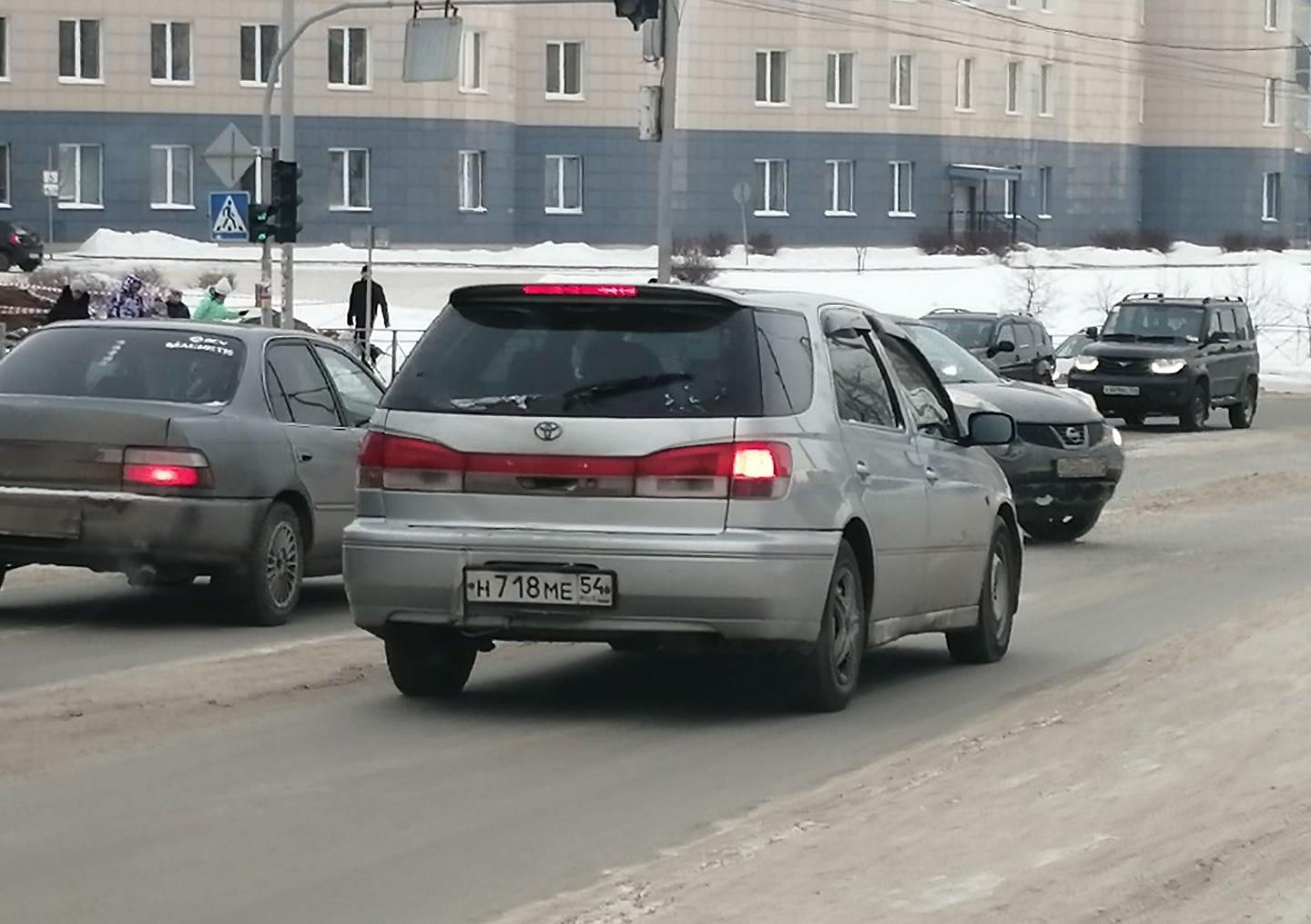 Автомобиль госномер Н718МЕ54