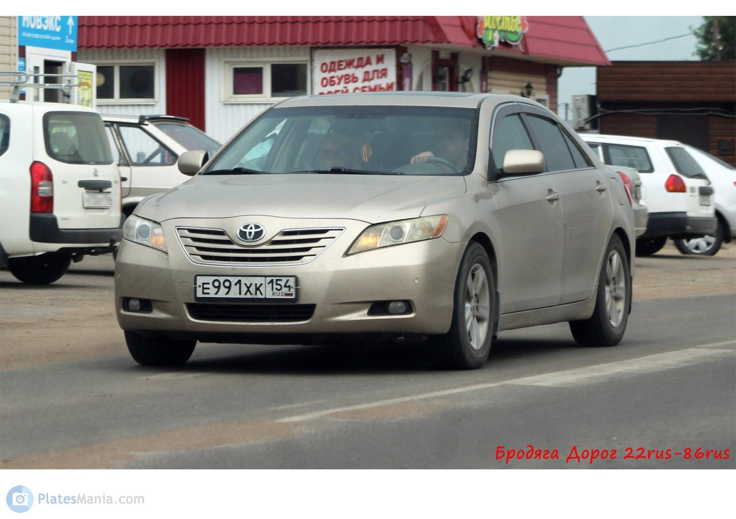 Автомобиль госномер Е991ХК154