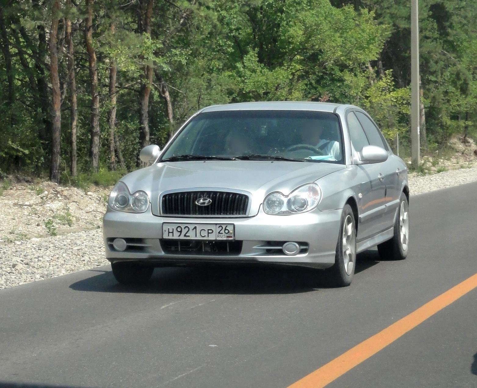 Автомобиль госномер Н921СР26