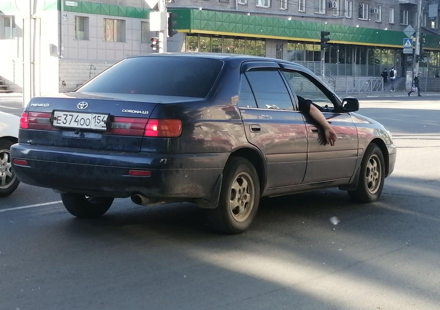 Автомобиль госномер Е374ОО154