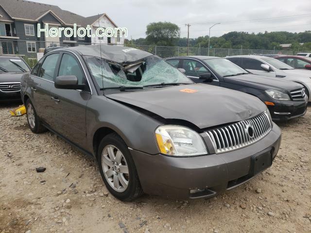null gray sedan 4d gas 1MEFM401X5G615201 photo #1