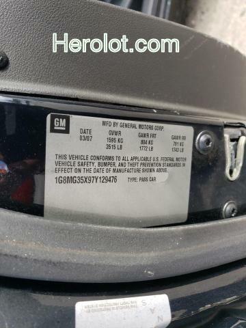 null black  gas 1G8MG35X97Y129476 photo #3