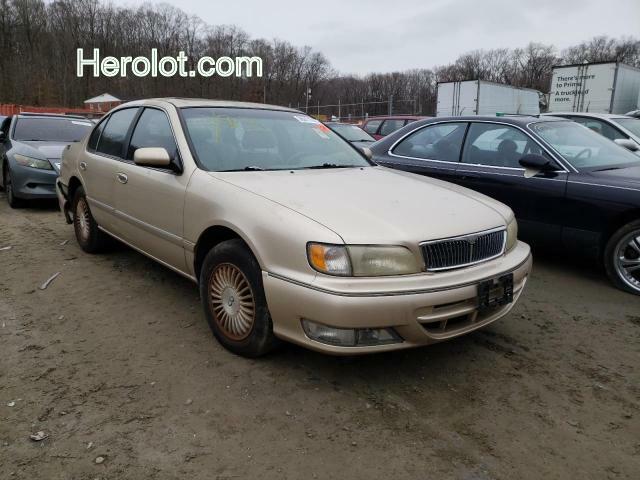 null gold sedan 4d gas JNKCA21D5VT507861 photo #1