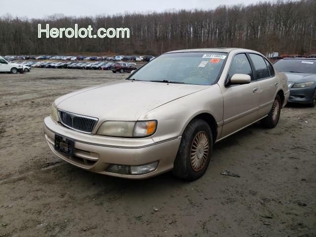 null gold sedan 4d gas JNKCA21D5VT507861 photo #3