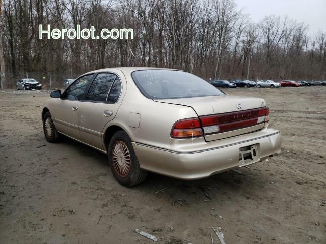 null gold sedan 4d gas JNKCA21D5VT507861 photo #4