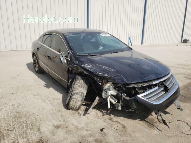 null black  gas WVWMN7AN7AE563749 photo #1