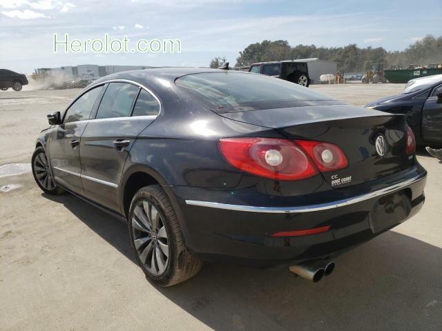 null black  gas WVWMN7AN7AE563749 photo #4