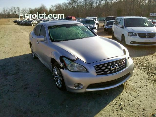 null silver sedan 4d gas JN1BY1AR0CM393843 photo #1