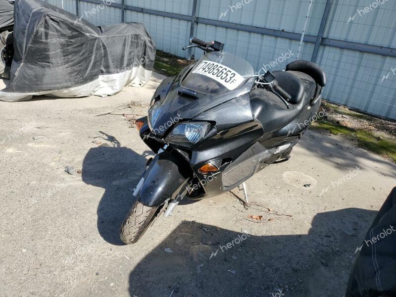 HONDA NSS250 AS 2004 black  gas JH2MF06H24K000161 photo #3