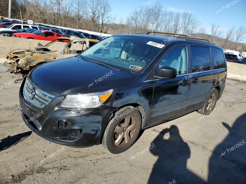 VOLKSWAGEN ROUTAN 2011 black  flexible fuel 2V4RW3DG9BR695365 photo #1