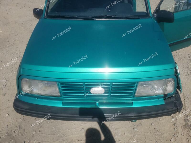 GEO TRACKER 1994 turquoise  gas 2CNBJ18U6R6950284 photo #4