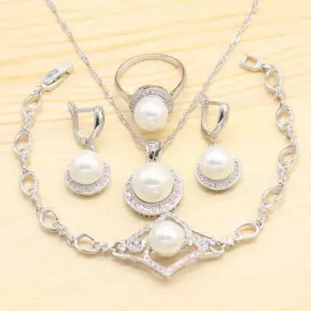 Браслет с белым жемчугом серебряного цвета