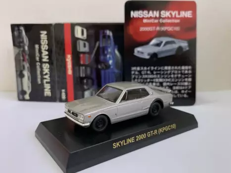Коллекционная модель тележки первого поколения 1/64 KYOSHO Nissan Skyline 2000 KPGC10 God of War