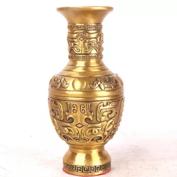 Медная ваза с животным рисунком.