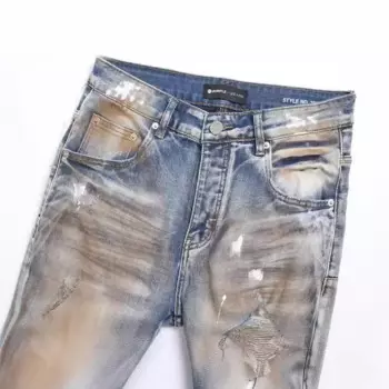Мужские рваные джинсы с эффектом потертости