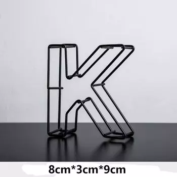 Статуэтка кошки из металла чёрного цвета