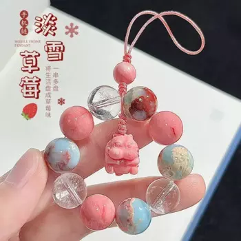 Женская маленькая сумка-брелок розового цвета