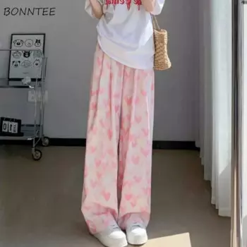Женские удобные драпированные брюки с высокой талией и принтом