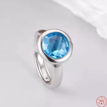 Женское и мужское кольцо из серебра 925 пробы с топазом