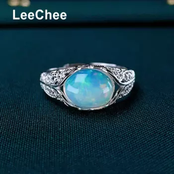 Женское кольцо из серебра 925 пробы с опалом, 8 х10 мм