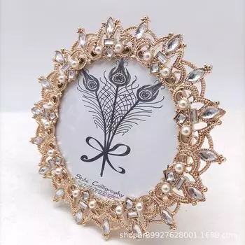 Золотая фоторамка theuphela