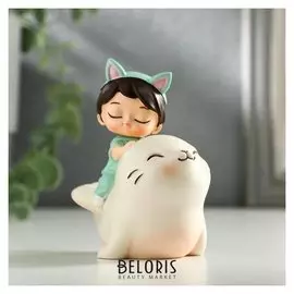 Сувенир полистоун "Малышка на морском котике" пружинка 8,5х7х5 см