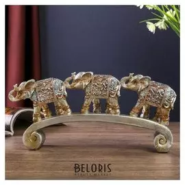 Сувенир полистоун "Серебристые слоны в ажурных бирюзовых попонах на дуге" 12,2х28х5,2 см