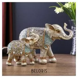 Сувенир полистоун "Серебристый слон слонёнок в ажурных бирюзовых попонах" 14,8х23,3х12 см