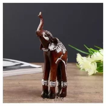 Сувенир полистоун "Слон на длинных ногах, попона с серебристыми узорами" 15х6,5х4 см