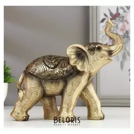 Сувенир полистоун "Золотистый слонёнок с пальмовыми листьями на попоне" 17,5х7х19 см