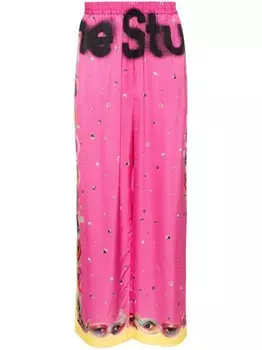 Acne Studios широкие брюки с графичным принтом, розовый