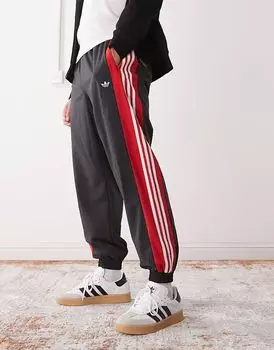 Adidas Originals - Спортивные брюки черного и красного цветов