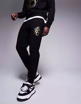 Armani Exchange Lunar Capsule брюки-джоггеры с принтом змеи черные