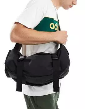 ASOS DESIGN – черная прорезиненная сумка через плечо с карманом и пряжкой