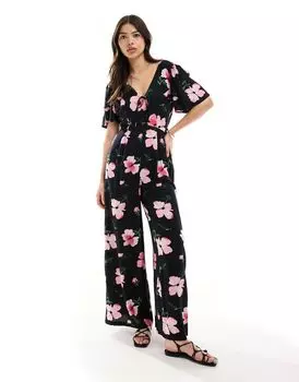 ASOS DESIGN — Широкий комбинезон с рюшами на рукавах и цветочным принтом на темном фоне