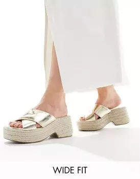 ASOS DESIGN Wide Fit – Toy – Мюли на танкетке золотого цвета с перекрещенными ремешками