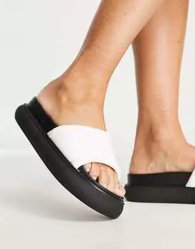 Белые шлепанцы на плоской платформе Public Desire Woke